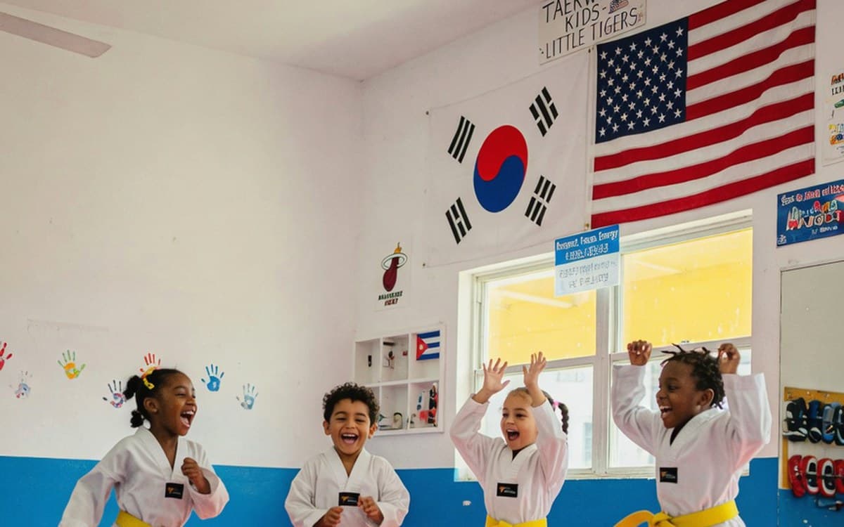Preschoolers laughing during a playful taekwondo drill